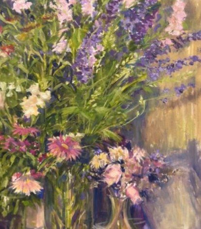 Still life of lavender, pink and white flowers in a glass vase